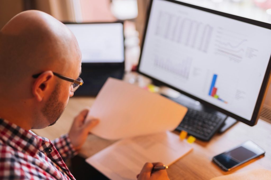 Entrepreneur doing his finance statements